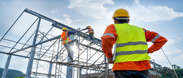 Workers on a roof construction site